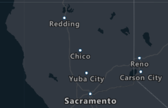 Water is a dark charcoal color, and land is a somewhat lighter charcoal color.